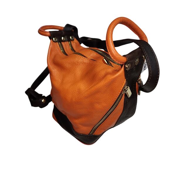 VALENTINA LEATHER EUC ORANGE PEBBLED LEATHER SLING BACKPACK BAG